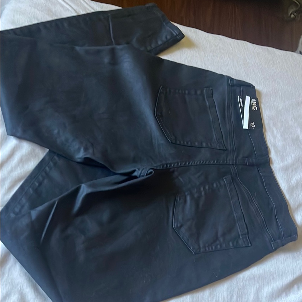 INC International Concepts women’s black coated, wet look skinny Jeans
